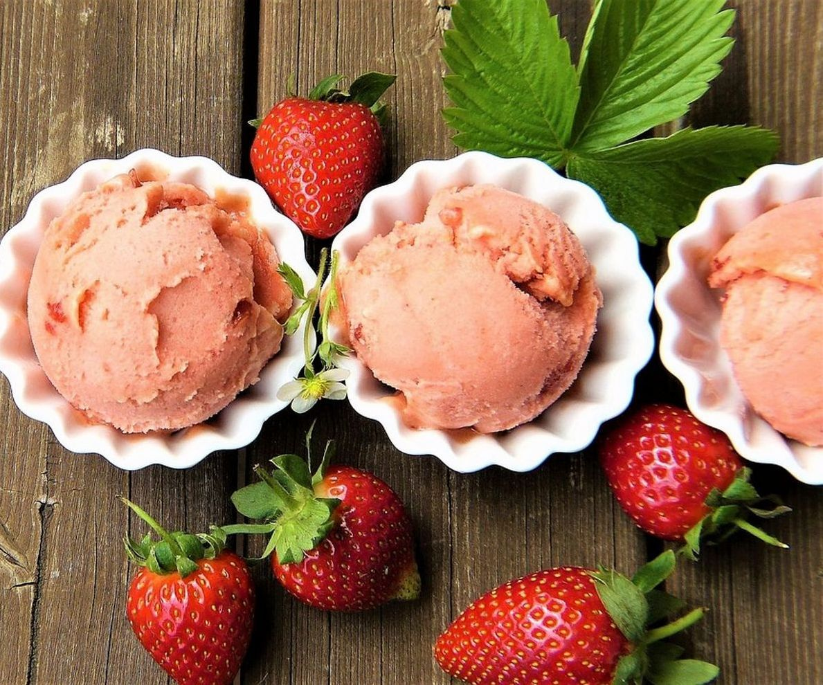 The gelato display case showing our rotating selection of fresh flavors